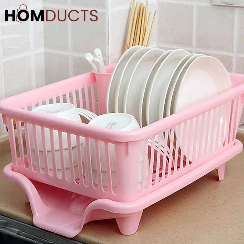 Pink dish rack with upright plates and a separate utensil holder