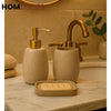 3-Piece Ceramic Bathroom Accessory Set with Golden Pump – Soap Dispenser Toothbrush Holder & Soap Dish