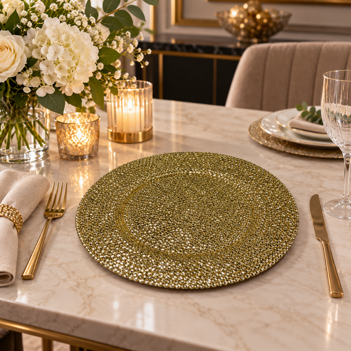 Gold textured round decorative charger plate on an elegant dining table