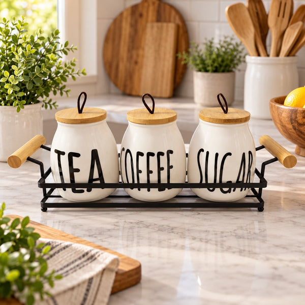 Ceramic tea coffee and sugar canister set with metal rack in a kitchen