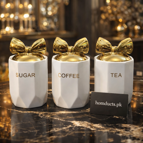 Luxury White Ceramic Tea, Coffee & Sugar Jar Set with Gold Bow Lids – 3-Piece Kitchen Storage Set