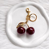 Luxury Sparkling Cherry Keychain – Red Enamel with Gold Detailing