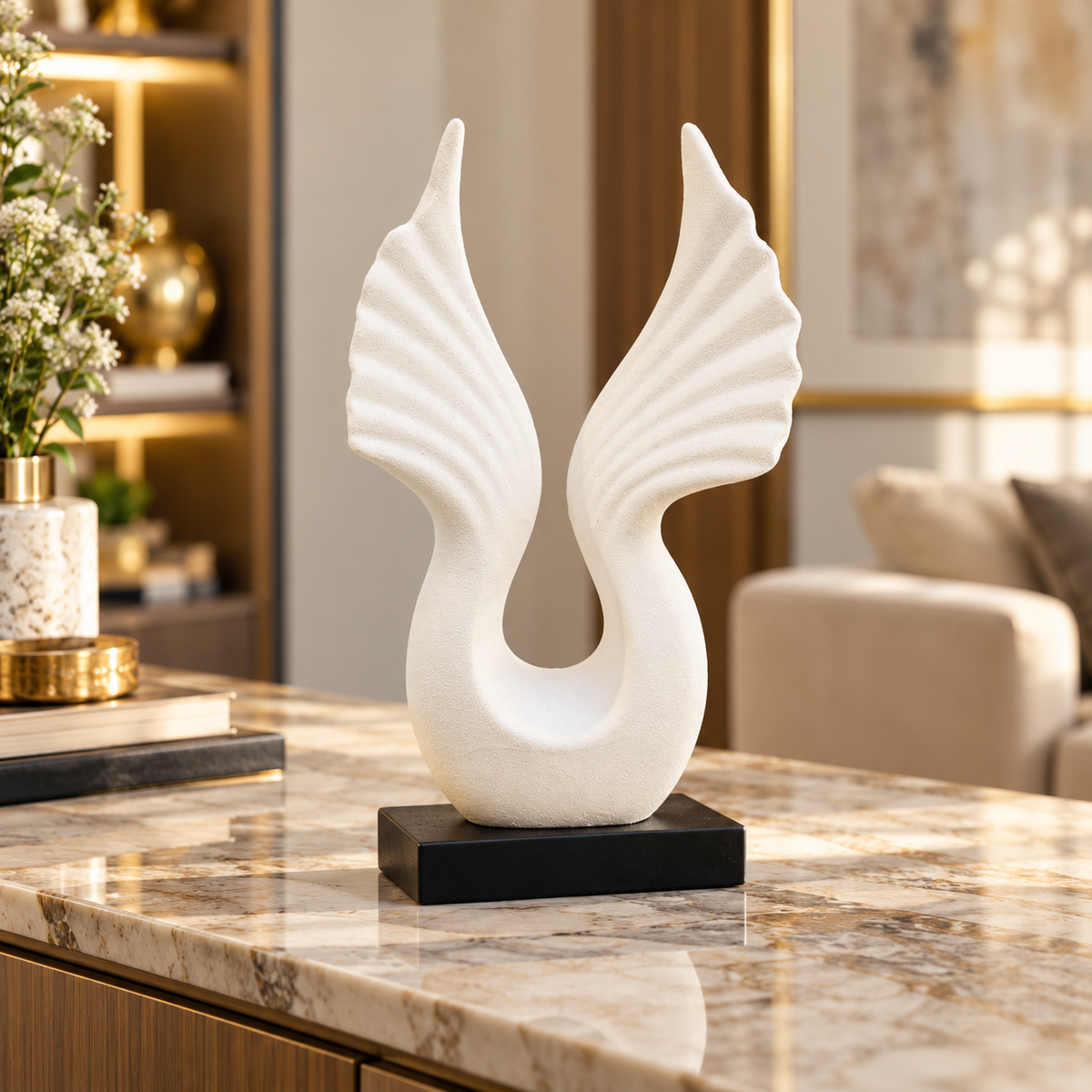 White abstract twin wing ceramic sculpture on a black base