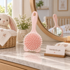 Round double-sided baby hair brush with back mirror