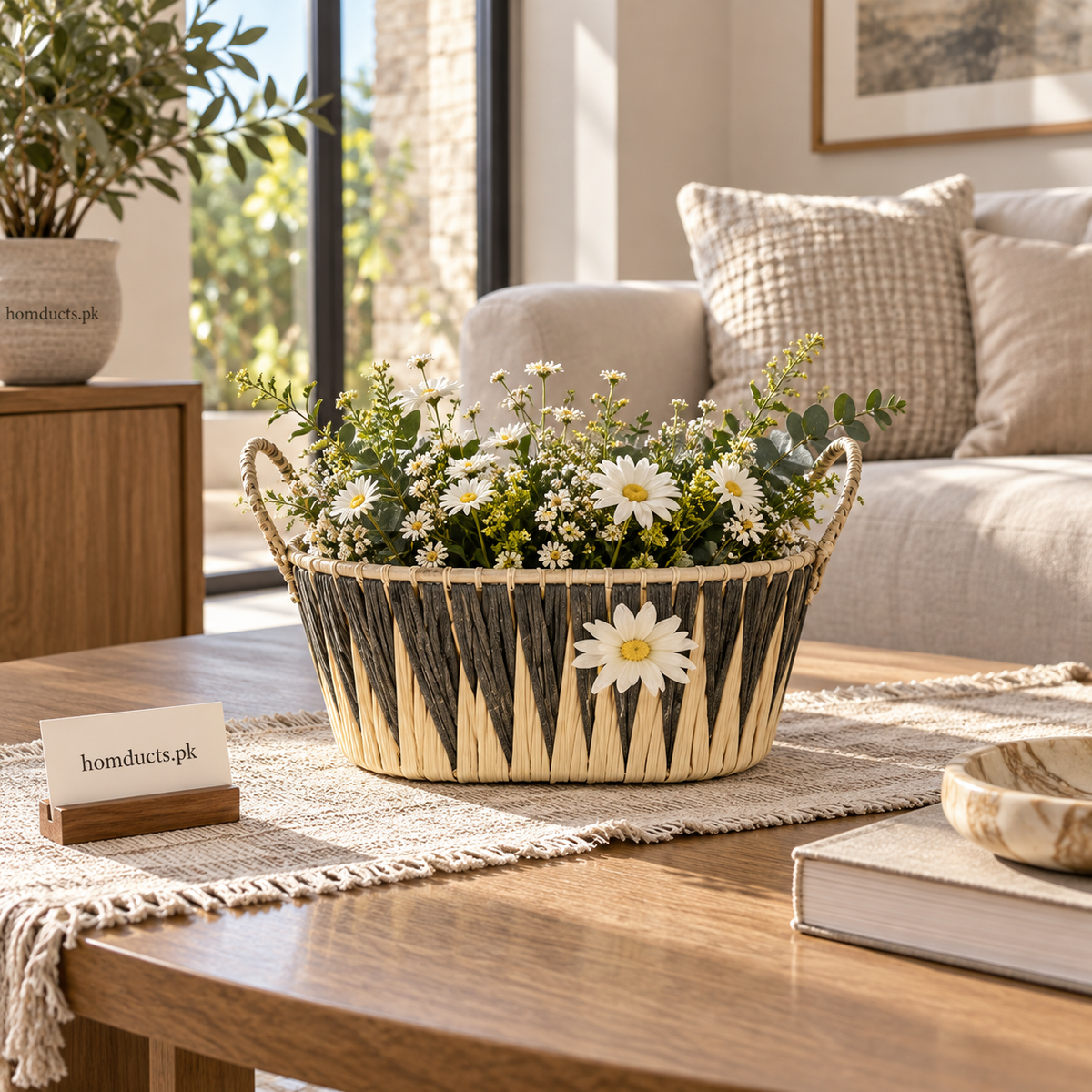 Oval woven flower basket with contrasting pattern