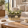 Oval woven flower basket with contrasting pattern
