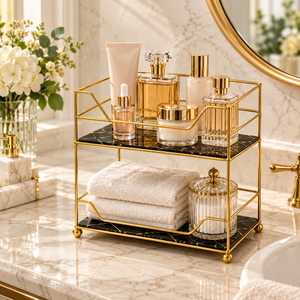 Gold two-tier vanity organizer with black marble base