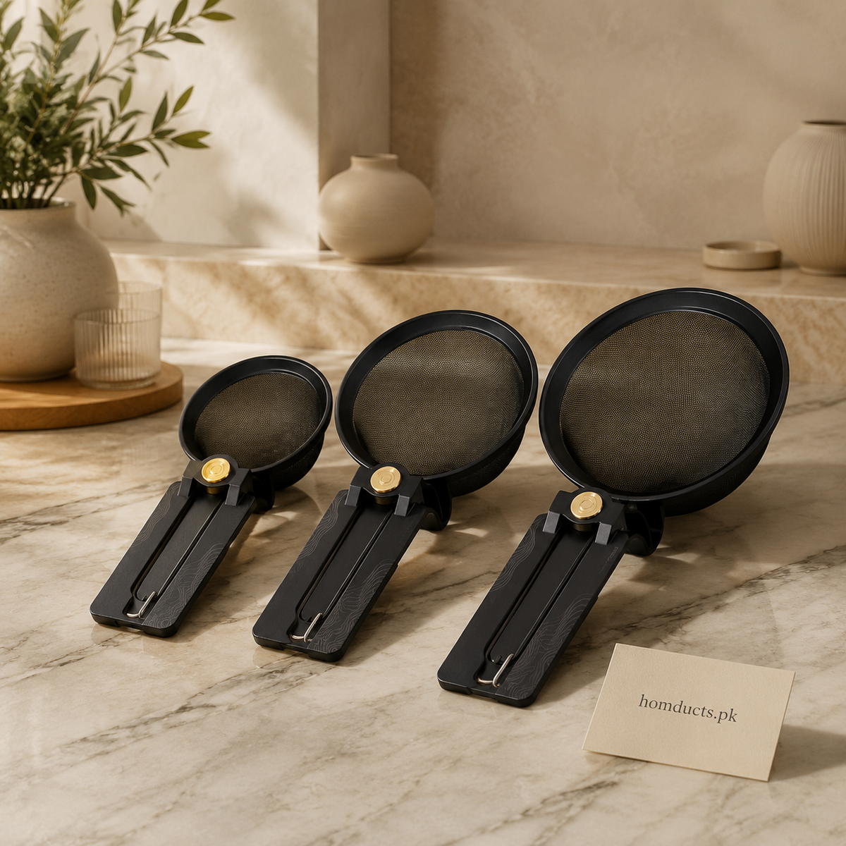 Black stainless steel flour strainer set in three sizes