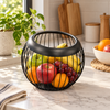 Black Round Wire Fruit Basket styled in a premium kitchen setting