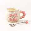 Cherry bow ceramic mug and matching spoon product detail