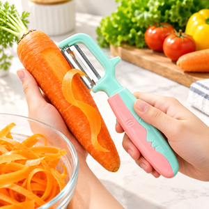 Dual-head vegetable peeler