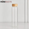 Elegant Cylindrical Glass Bottle with Stylish Wooden Lid - Perfect for Home & Office