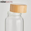 Elegant Cylindrical Glass Bottle with Stylish Wooden Lid - Perfect for Home & Office