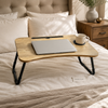 Foldable laptop bed table with cup holder and device slot