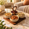 Four-bowl snack serving set with central heart carry handle