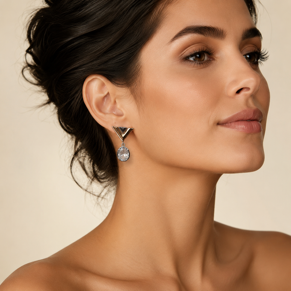 Luxury Two-Tone Geometric Crystal Drop Earrings worn by a female model