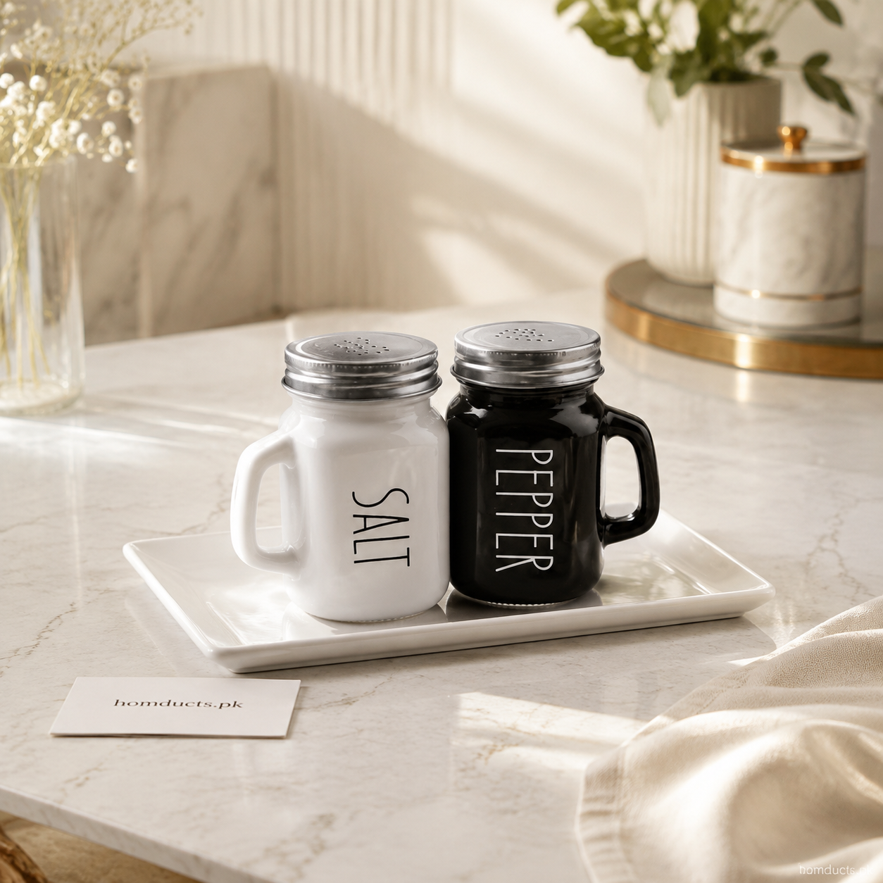 White and black glass salt and pepper shaker set with handles