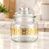 Luxury glass storage jar with gold geometric design and lid