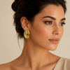 Luxury Gold Oval Spiral Stainless Steel Stud Earrings worn by a female model