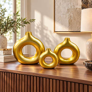 Three piece gold round donut decorative vase set