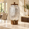 Hammered glass beverage dispenser with wooden stand and gold tap