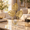 Gold monstera leaf crystal ball tabletop ornament