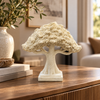 Cream sculptural tree ornament on a modern console