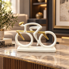 Cream and gold racing bicycle decorative sculpture