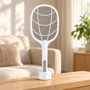 White rechargeable mosquito racket standing upright in its round base