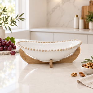 Pearl-rim ceramic serving bowl with wooden stand