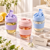 350ml glass cups with ribbed pastel sleeves and lids