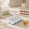 Eight-cube ice tray with fitted clear lid and flexible bases