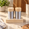 Stainless steel salt and pepper shaker set with light wood stand