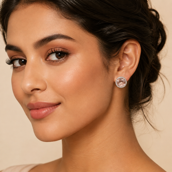 Luxury Blush Pink Round Crystal Halo Stud Earrings worn by a female model