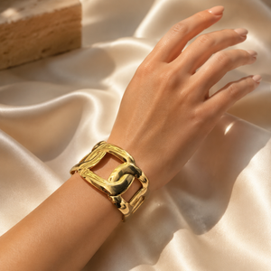 Luxury Gold Open-Link Statement Bracelet worn on an elegant feminine wrist