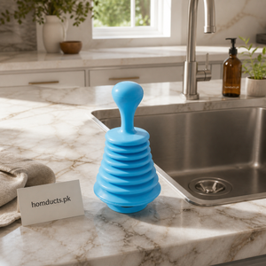 Hatimi manual accordion sink drain pump beside a kitchen sink
