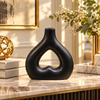 Black Heart-Cutout Sculptural Ceramic Vase – 9 Inch styled in a modern interior