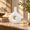 White Swirl Open-Centre Ceramic Vase – 10 Inch styled in a modern interior