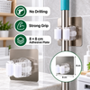 Self adhesive mop holder installation and grip features