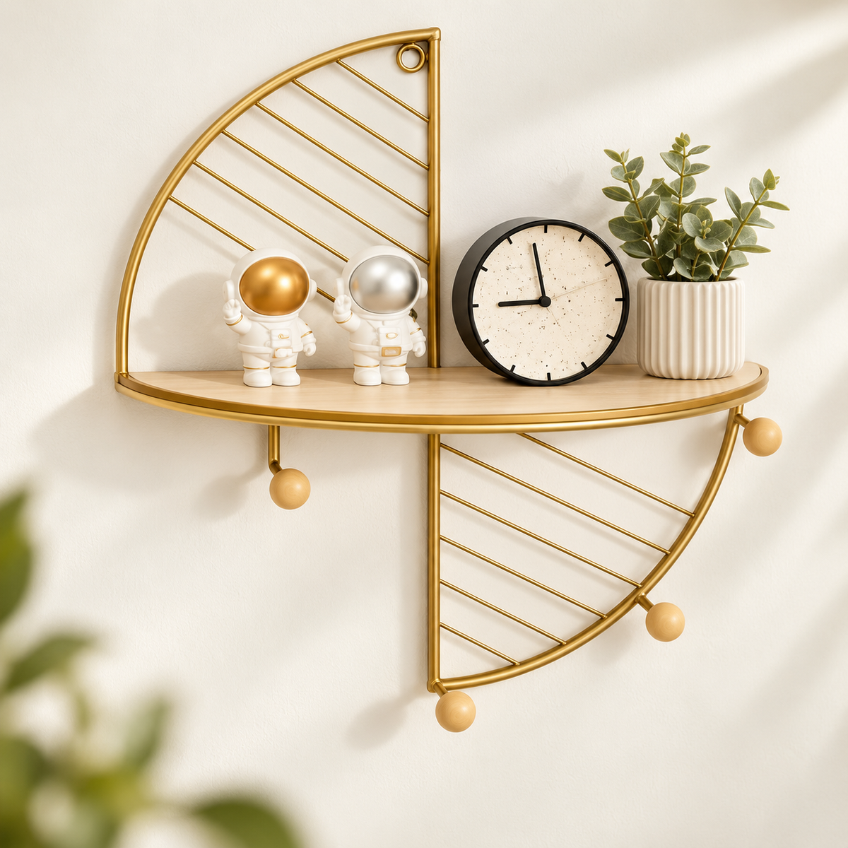 Decorative half-round gold wall shelf with hooks