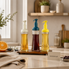 Trigger top glass oil and vinegar dispensers