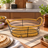 Oval Cane-Style Roti Serving Basket styled in a premium kitchen setting
