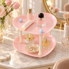 Pink two-tier heart-shaped organizer for bedside essentials