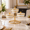 Porcelain condiment serving set with gold stand