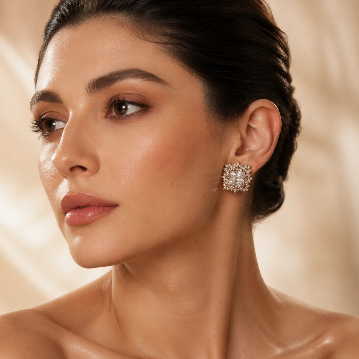 Regal Clear Square Crystal Floral Halo Stud Earrings worn by a female model