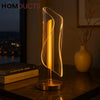 Sculptural LED Wave Lamp – Modern Acrylic Light with Gold Cor