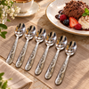 Six-piece stainless steel floral dessert spoon set