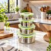 Four piece stainless steel food container set with green locking lids