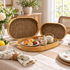 3-Piece Oval Bamboo & Woven Rattan Serving Tray Set styled on a dining table