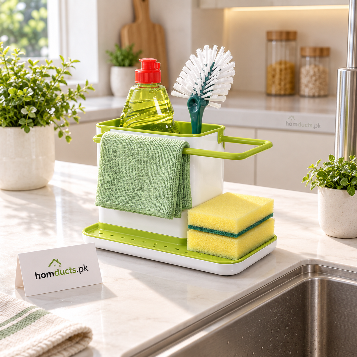 White and green kitchen sink organizer with towel rail, brush and sponge storage